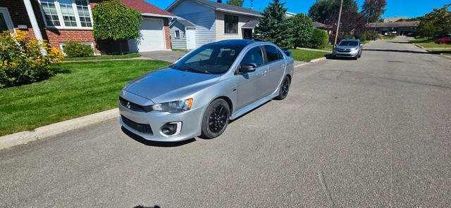 2017 Mitsubishi Lancer, strieborná, 210 000 km, dovoz Kanada — foto 1 z 5 2017 Mitsubishi Lancer, strieborná, 210 000 km, dovoz Kanada — foto 1 z 5
