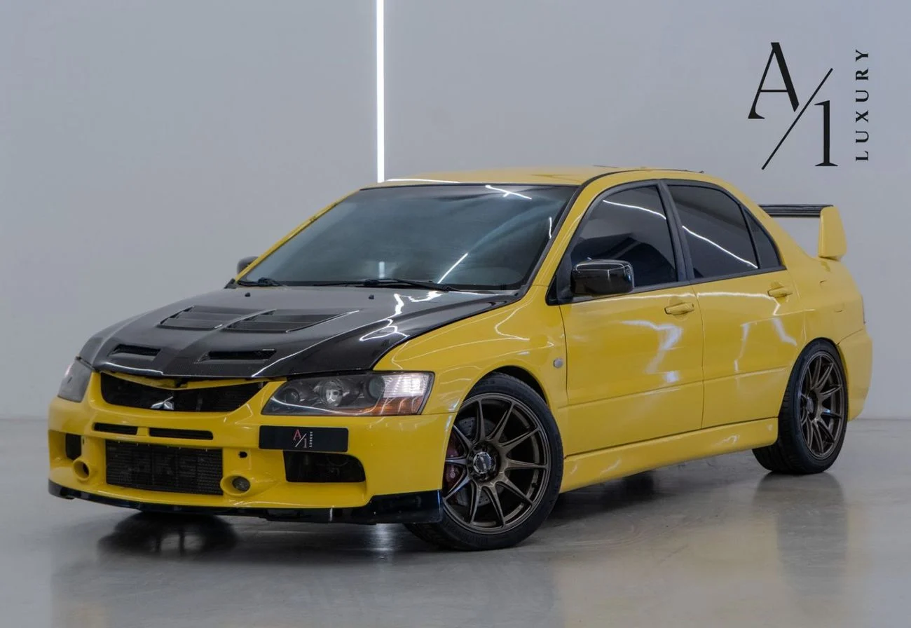 2006 Mitsubishi Lancer EVO IX, žltá, 111 500 km, dovoz SAE — foto 1