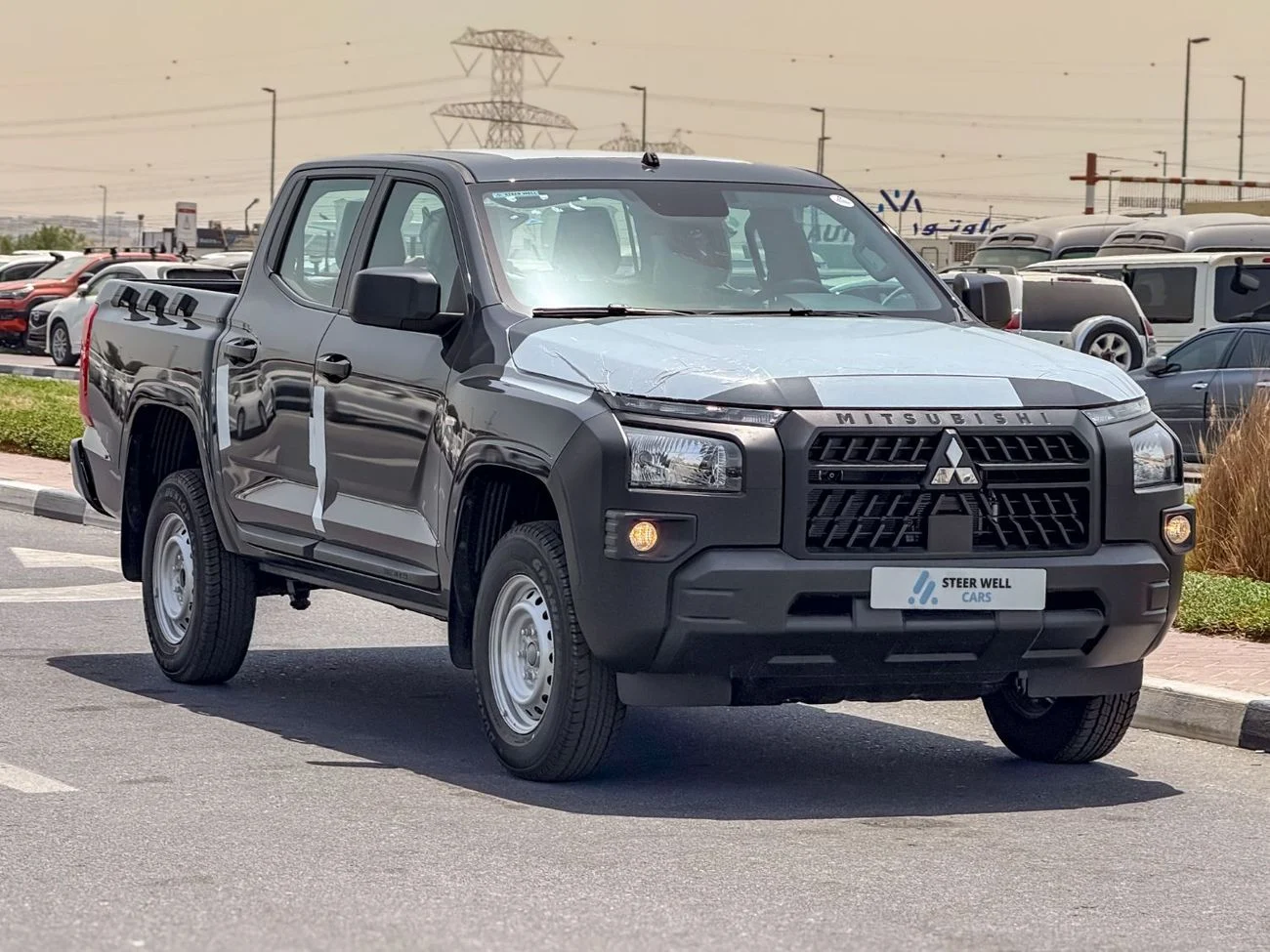 2027 Mitsubishi L200, šedá, 0 km, dovoz SAE — foto 1