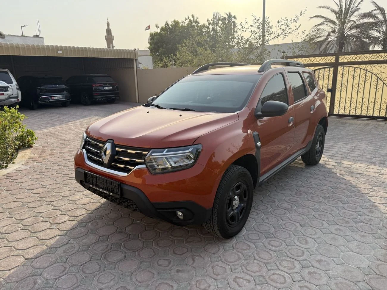 2024 Renault Duster PE, oranžová, 7 483 km, dovoz SAE — foto 1