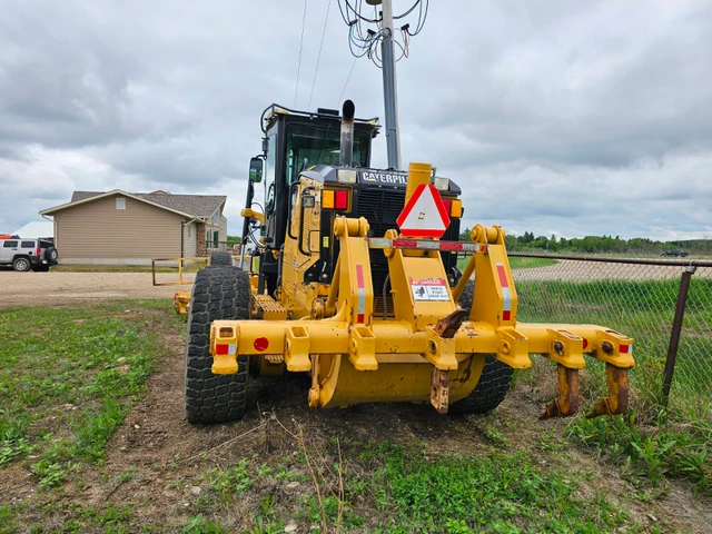 2014 Caterpillar 14M, 10 348 mth, dovoz Kanada — foto 5 z 5
