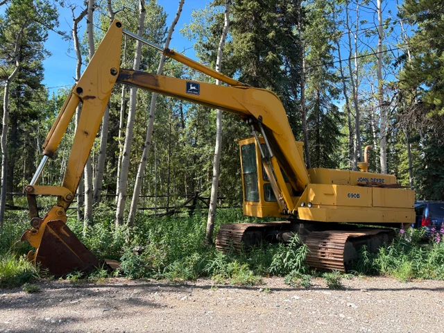 John Deere 690B, dovoz Kanada — foto 1