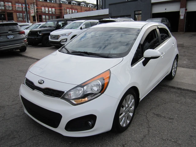 2015 Kia Rio, biela, 95 443 km, dovoz Kanada — foto 1
