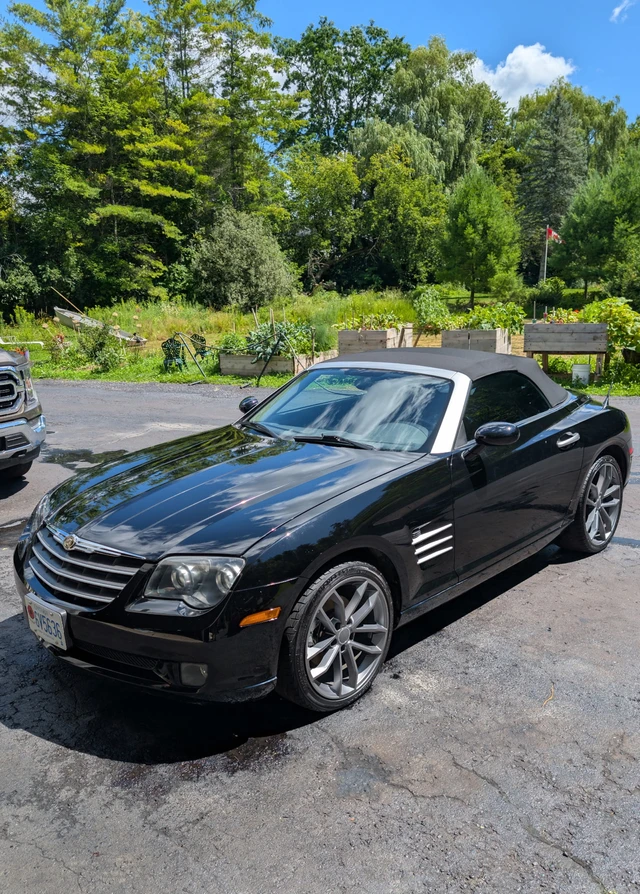 2005 Chrysler Crossfire, čierna, 56 000 km, dovoz Kanada — foto 1 z 5 2005 Chrysler Crossfire, čierna, 56 000 km, dovoz Kanada — foto 1 z 5