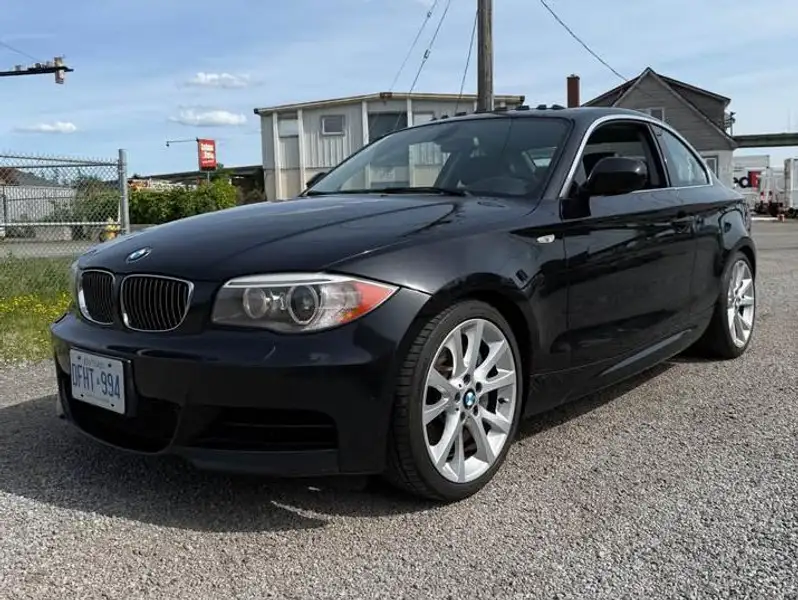 2012 BMW 1 Series, čierna, 135 000 km, dovoz Kanada — foto 1