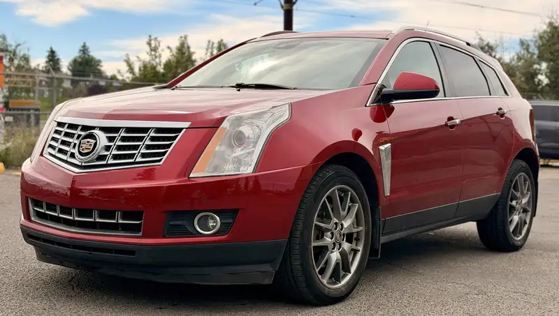 2016 Cadillac SRX AWD 4dr Premium, červená, 171 733 km, dovoz Kanada — foto 1