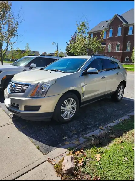 2015 Cadillac SRX, zlatá, 175 000 km, dovoz Kanada — foto 1 z 5 2015 Cadillac SRX, zlatá, 175 000 km, dovoz Kanada — foto 1 z 5
