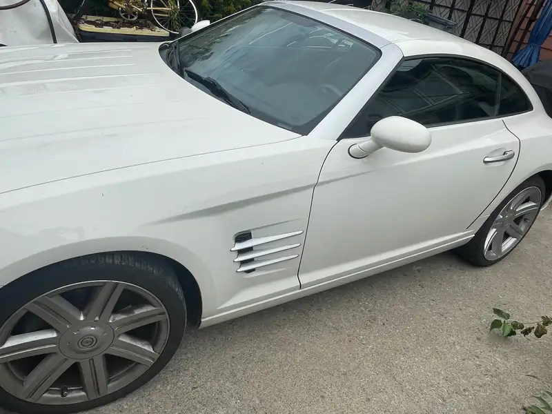 2006 Chrysler Crossfire Limited, biela, 147 005 km, dovoz Kanada — foto 1 z 4 2006 Chrysler Crossfire Limited, biela, 147 005 km, dovoz Kanada — foto 1 z 4