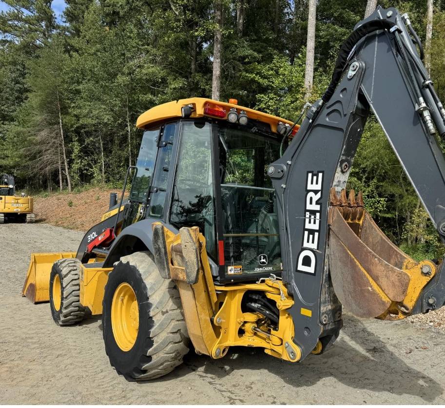 John Deere 310L, dovoz USA — foto 1