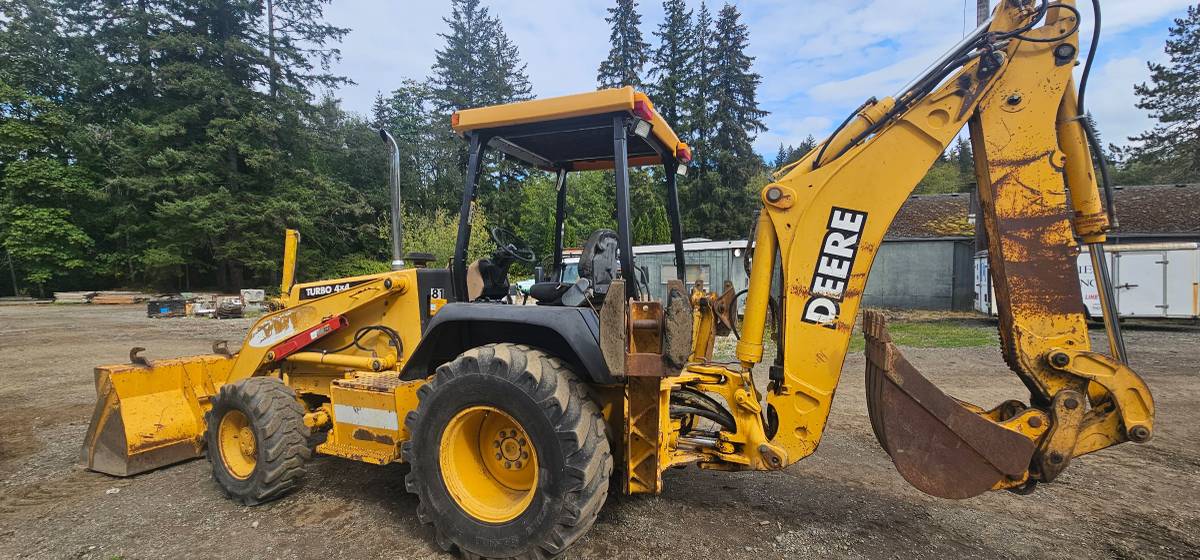 John Deere 310SE, dovoz USA — foto 1