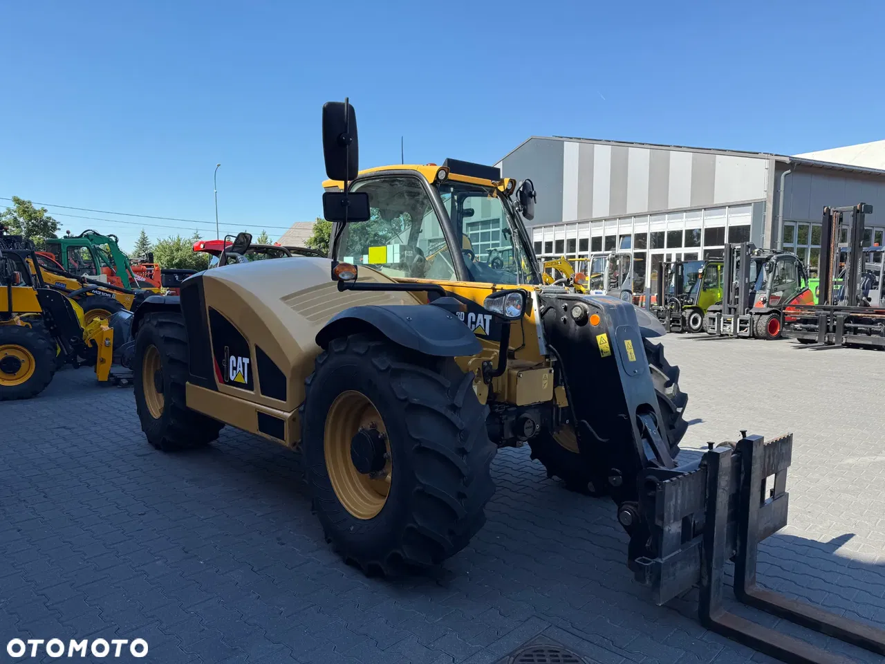 2018 Caterpillar TH 408 D, 4 960 mth, dovoz Skladom v EÚ — foto 7 z 24