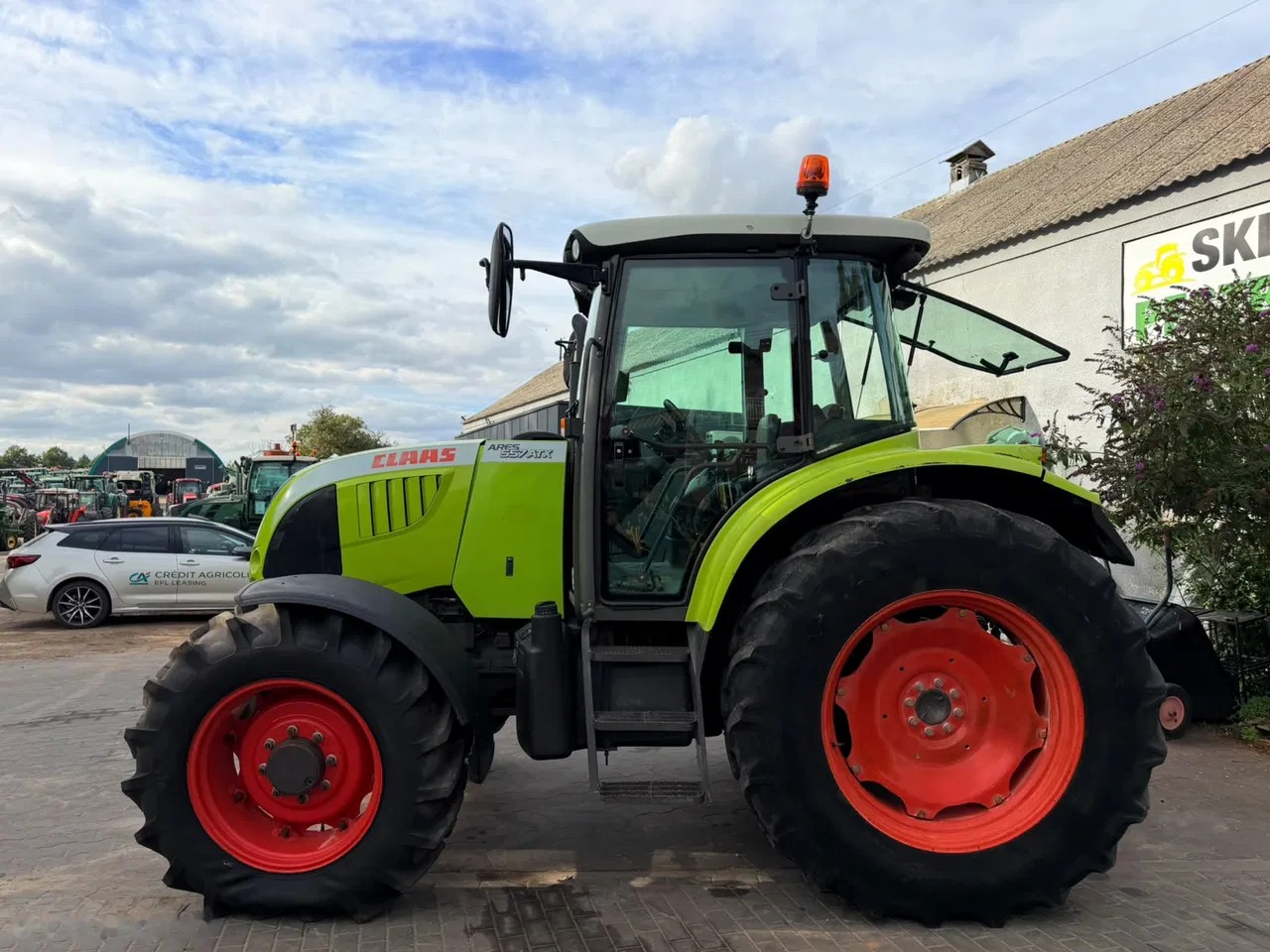 2009 Claas Ares 557 ATX, 5 878 mth, dovoz Skladom v EÚ — foto 3 z 24
