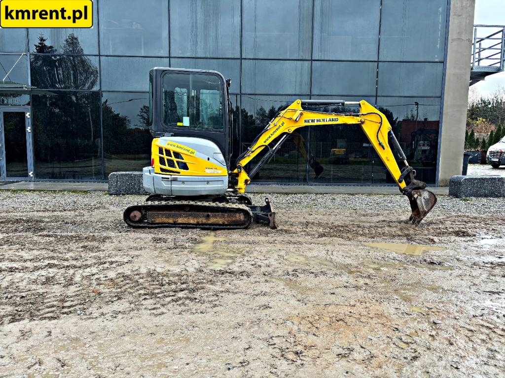 2014 New Holland E 29 B SR, 6 477 mth, dovoz Skladom v EÚ — foto 1