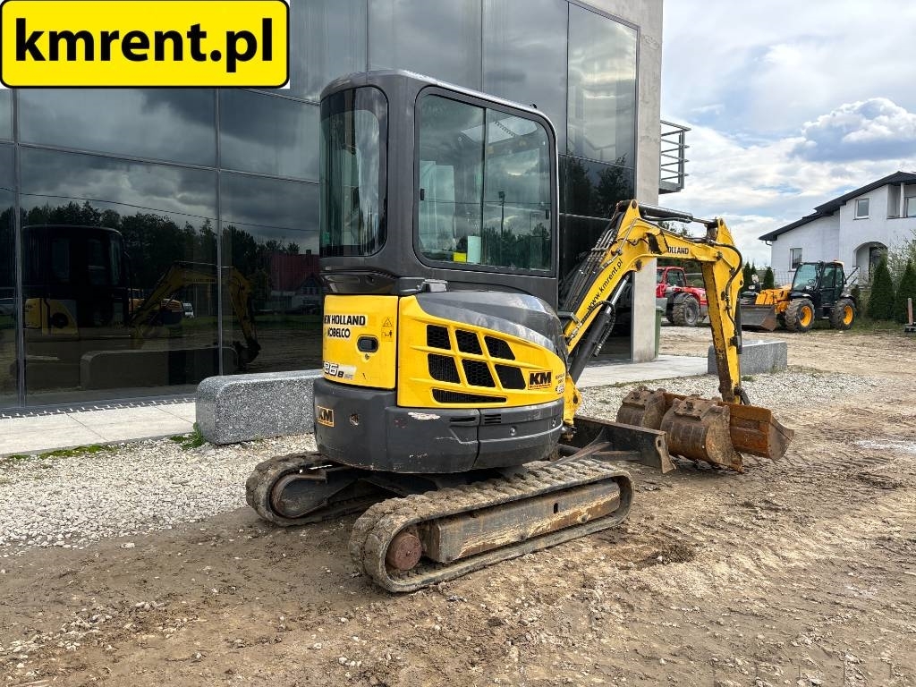 2012 New Holland E 26 B, 2 347 mth, dovoz Skladom v EÚ — foto 12 z 16