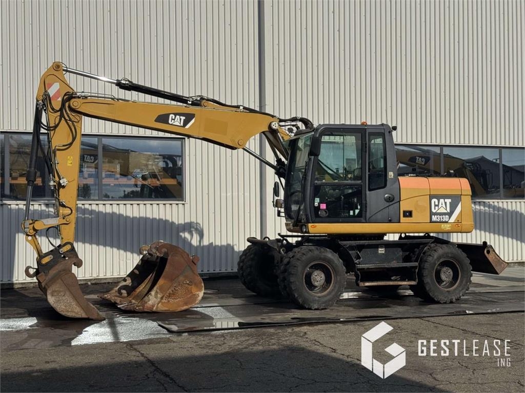 2014 Cat M313D, 6 134 mth, dovoz Skladom v EÚ — foto 1 2014 Cat M313D, 6 134 mth, dovoz Skladom v EÚ — foto 1