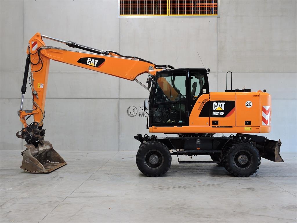 2017 Cat M318F, 10 208 mth, dovoz Skladom v EÚ — foto 1