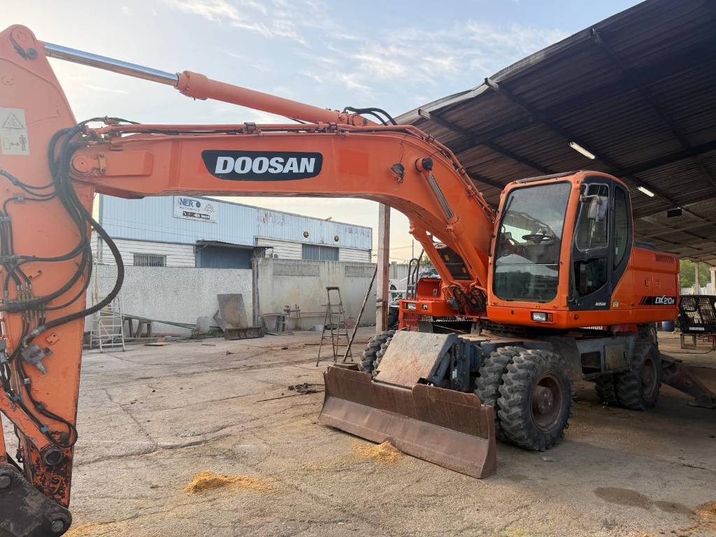 2009 Doosan DX 210 W, 14 000 mth, dovoz Skladom v EÚ — foto 1 | AMECAR 2009 Doosan DX 210 W, 14 000 mth, dovoz Skladom v EÚ — foto 1