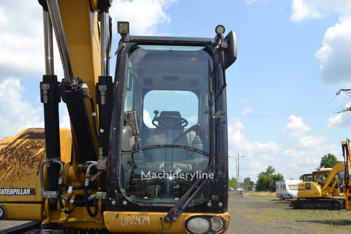 2012 Caterpillar M315D, 14 207 mth, dovoz Skladom v EÚ — foto 11 z 16