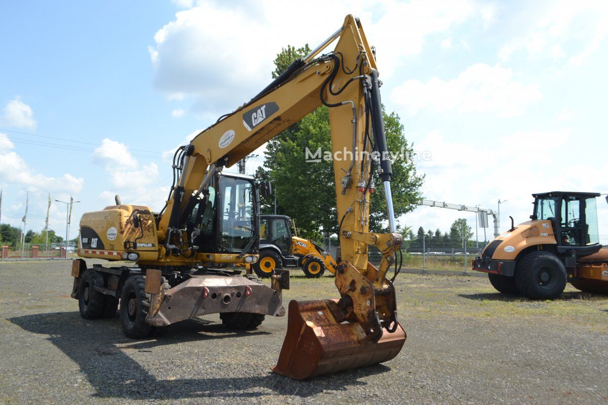 2012 Caterpillar M315D, 14 207 mth, dovoz Skladom v EÚ — foto 4 z 16
