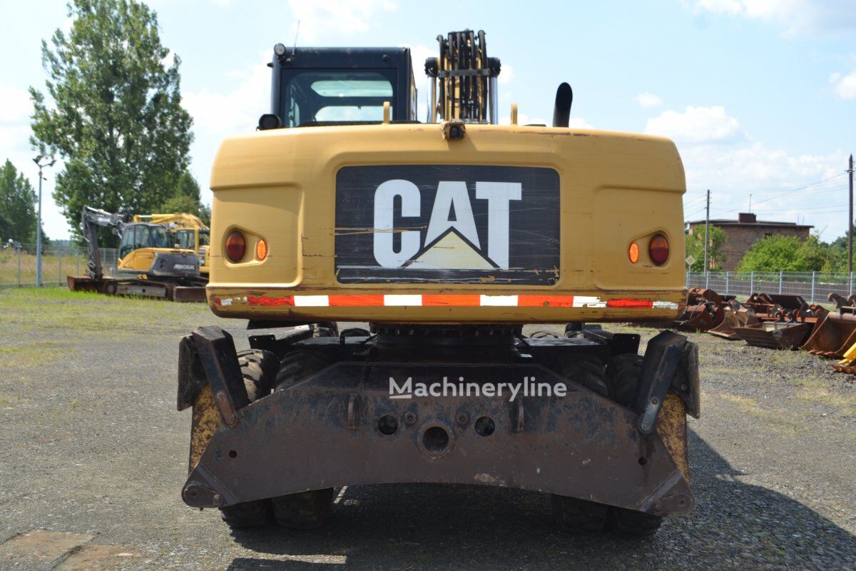 2012 Caterpillar M315D, 14 207 mth, dovoz Skladom v EÚ — foto 7 z 16