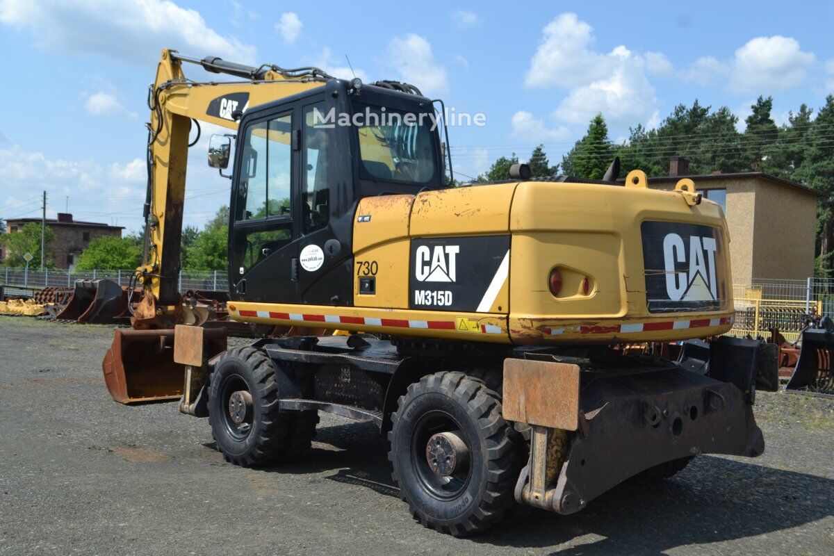 2012 Caterpillar M315D, 14 207 mth, dovoz Skladom v EÚ — foto 8 z 16