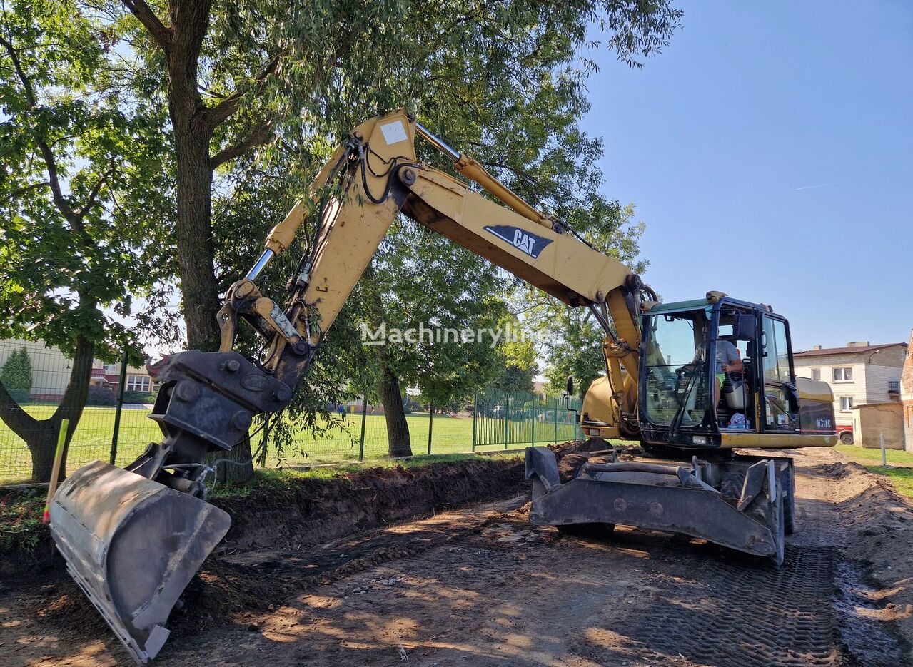 2003 Caterpillar 318C, 9 755 mth, dovoz Skladom v EÚ — foto 1