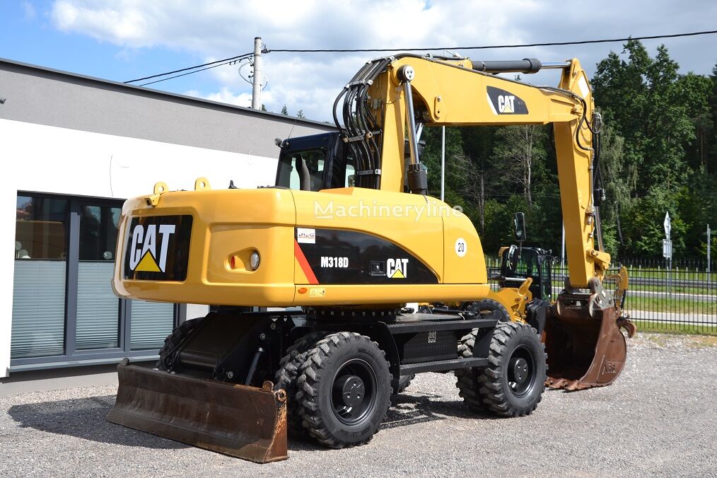 2012 Caterpillar 318, 9 500 mth, dovoz Skladom v EÚ — foto 10 z 16