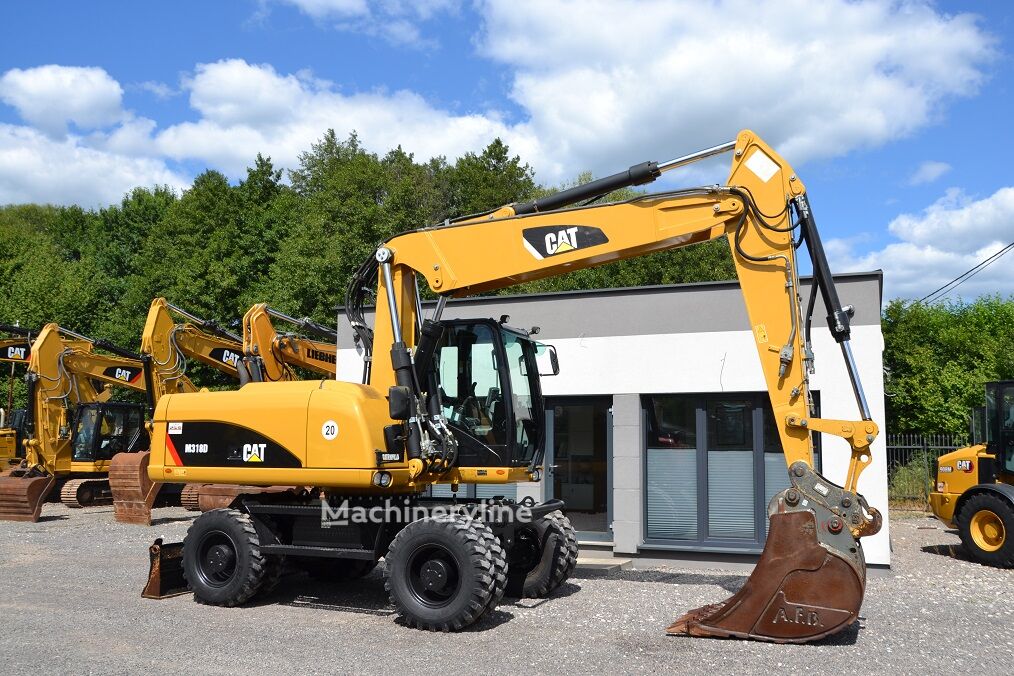 2012 Caterpillar 318, 9 500 mth, dovoz Skladom v EÚ — foto 13 z 16