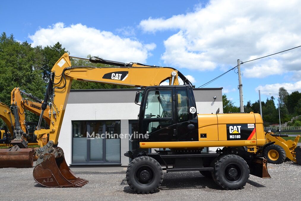 2012 Caterpillar 318, 9 500 mth, dovoz Skladom v EÚ — foto 4 z 16