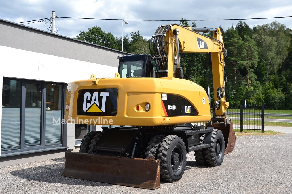 2012 Caterpillar 318, 9 500 mth, dovoz Skladom v EÚ — foto 9 z 16