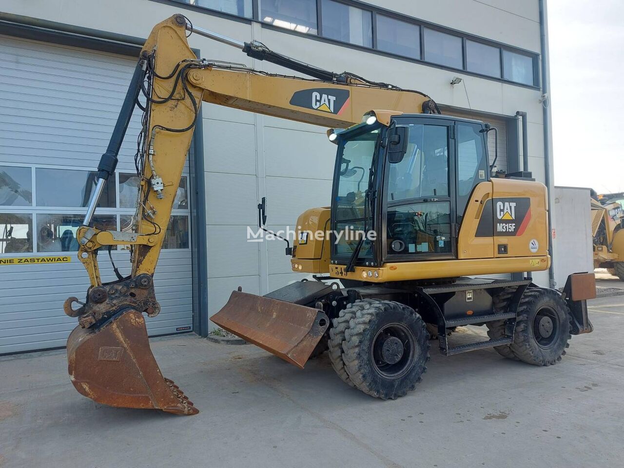 2020 Caterpillar M315F, 2 900 mth, dovoz Skladom v EÚ — foto 1