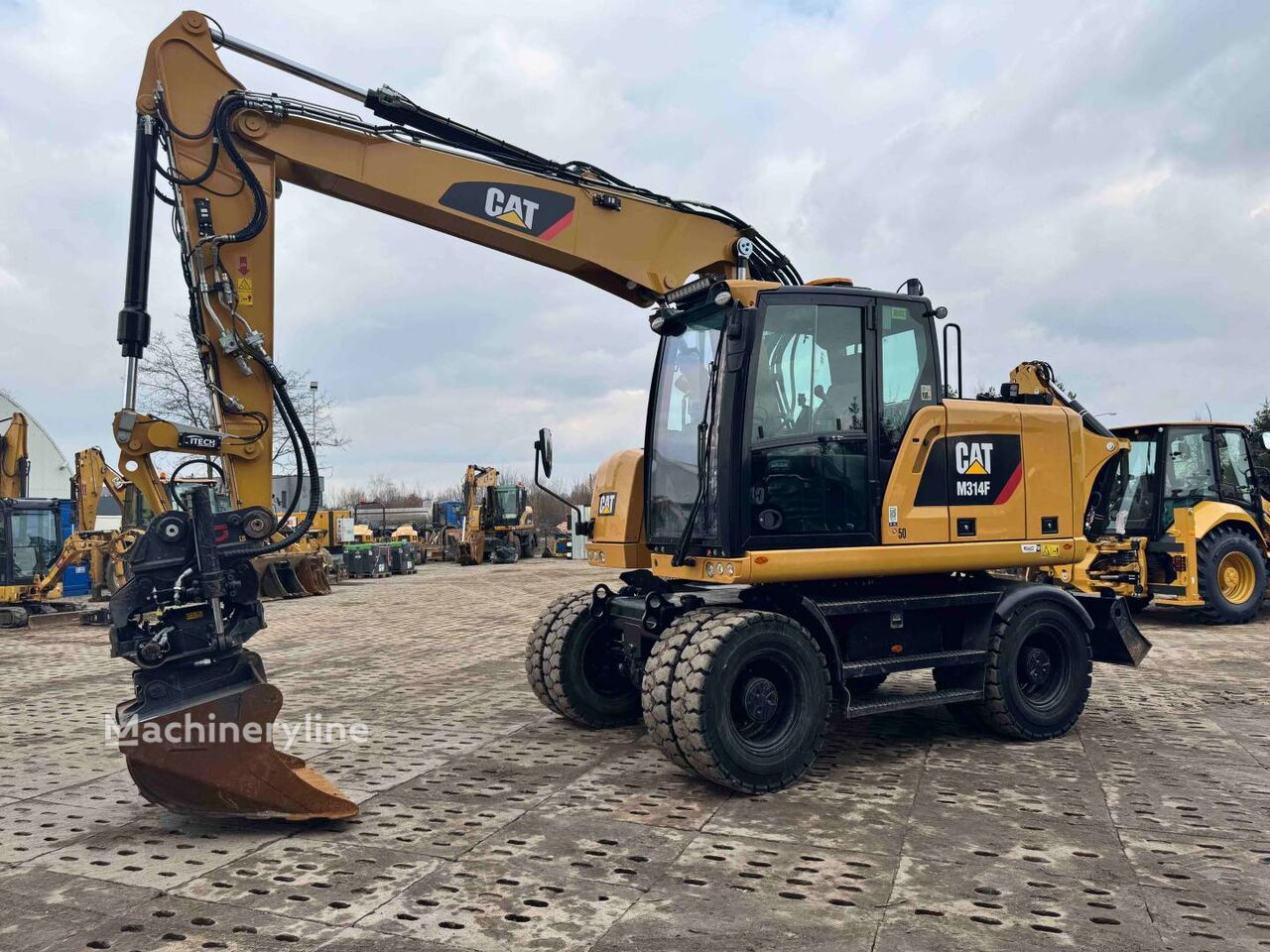 2019 Caterpillar M314F, 5 453 mth, dovoz Skladom v EÚ — foto 14 z 16