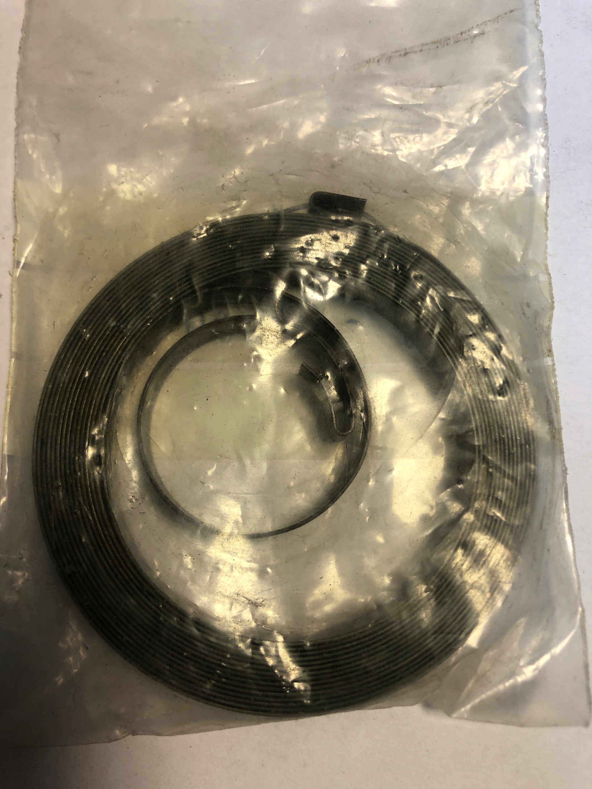 Sprezyna szarpaka TOHATSU NISSAN OE 338-05004-0, Skladom v EÚ — foto 1