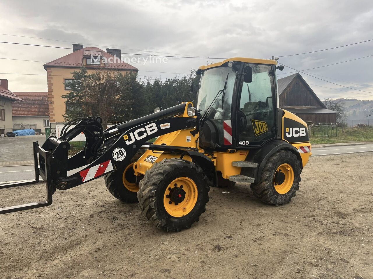 2012 JCB 409, 3 064 mth, dovoz Skladom v EÚ — foto 1
