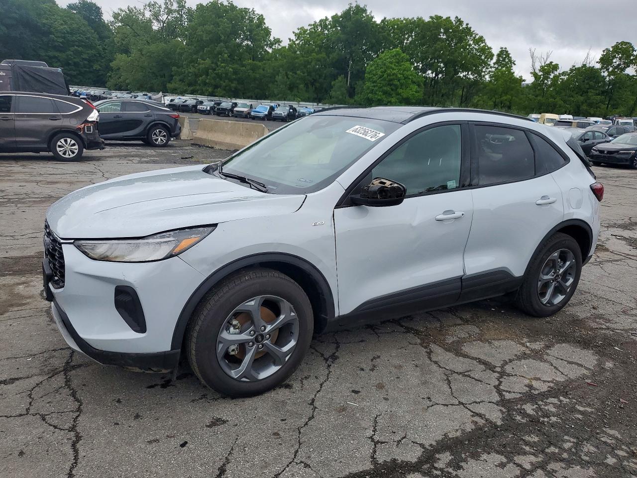 2026 Ford ESCAPE ST LINE, sivá, 565 km, dovoz USA — foto 1